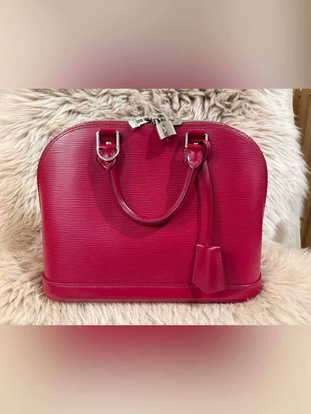Louis Vuitton Epi Alma PM Fuschia